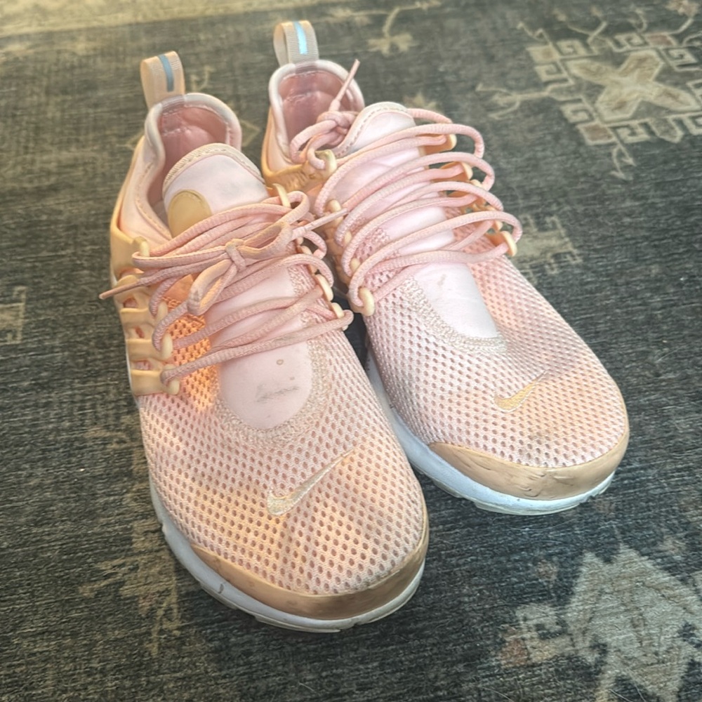 Pink salmon Nike shoes